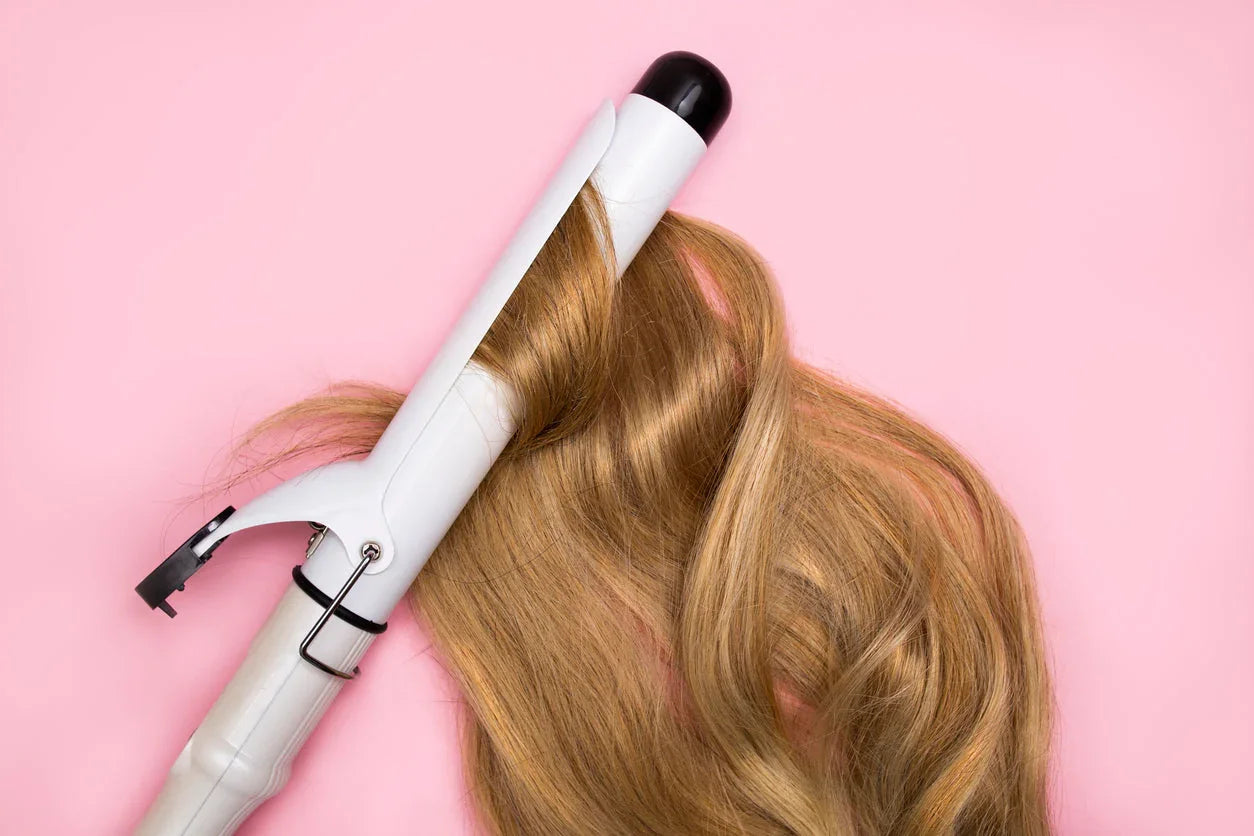 How to Properly Use Heat Styling Tools Without Damaging Your Hair